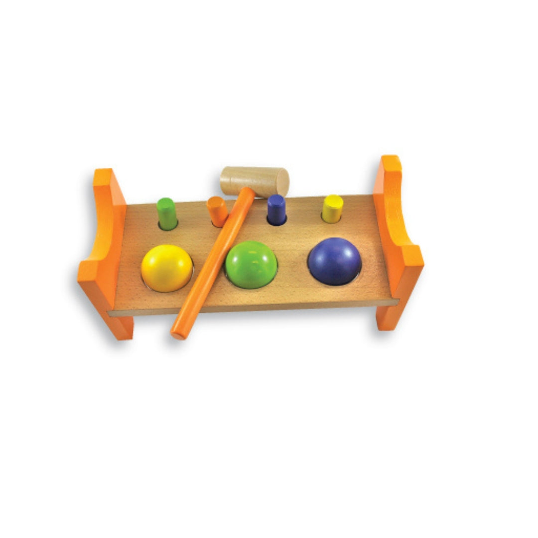 Colorful hammer and nails toy set on a white background