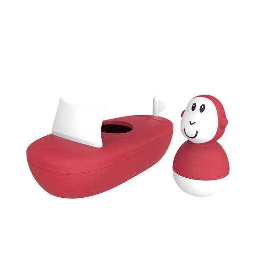 Red and white silicone boat set with bobbing monkey.