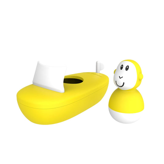 Yellow and white silicone boat set with bobbing monkey.