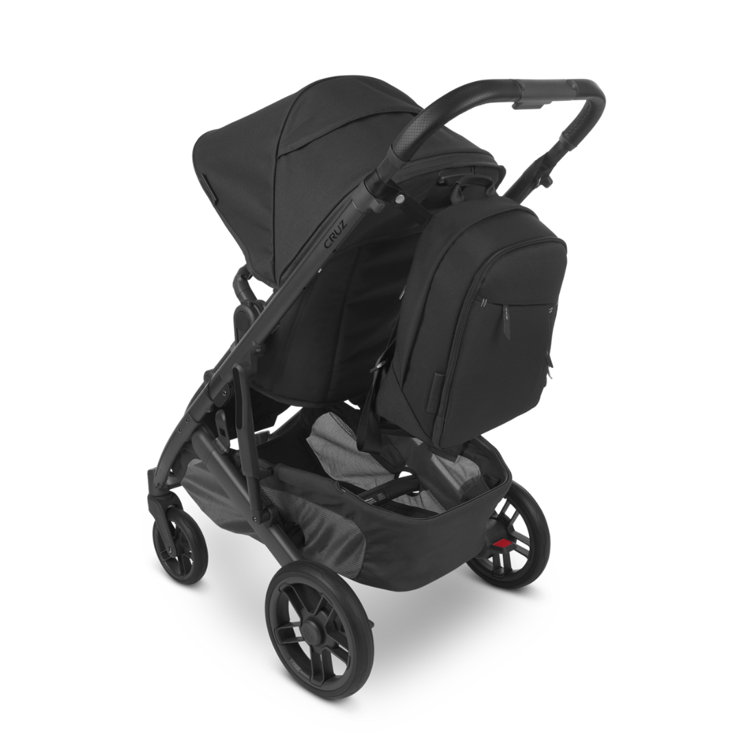 Black Changing Back Pack or Nappy Bag with Black leather handle shown on stroller.