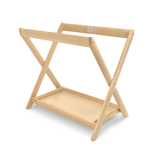 UPPAbaby in Home Bassinet Stand for UPPAbaby Bassinet in natural wood.