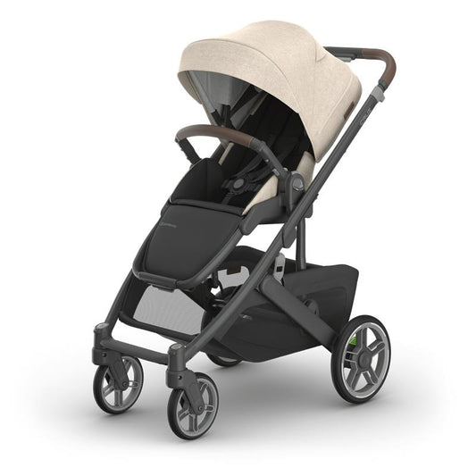 UPPAbaby Cruz v3 in beige canopy and black stroller frame on a white background