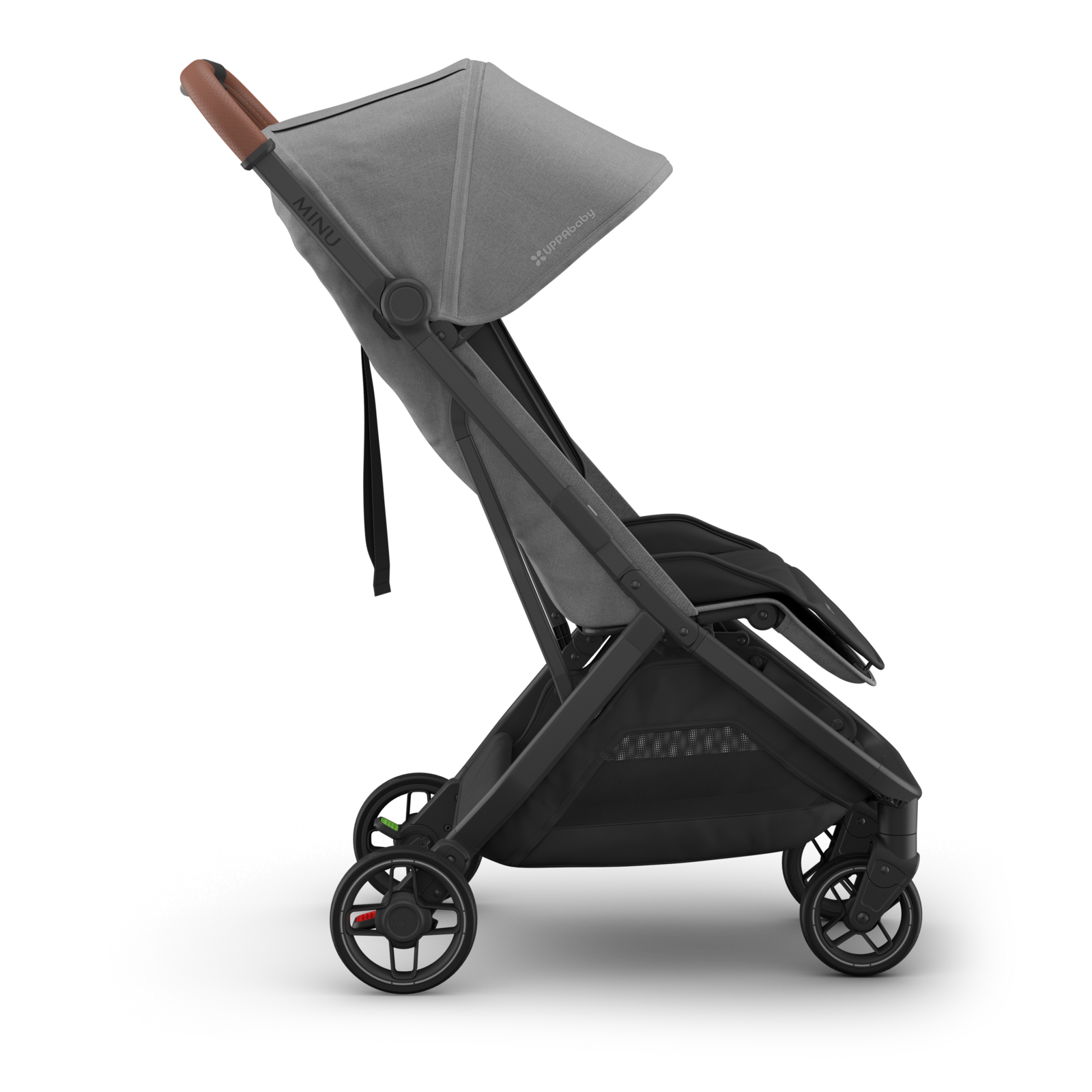Travel stroller with charcoal canopy, black frame and tan leather handle. Side.