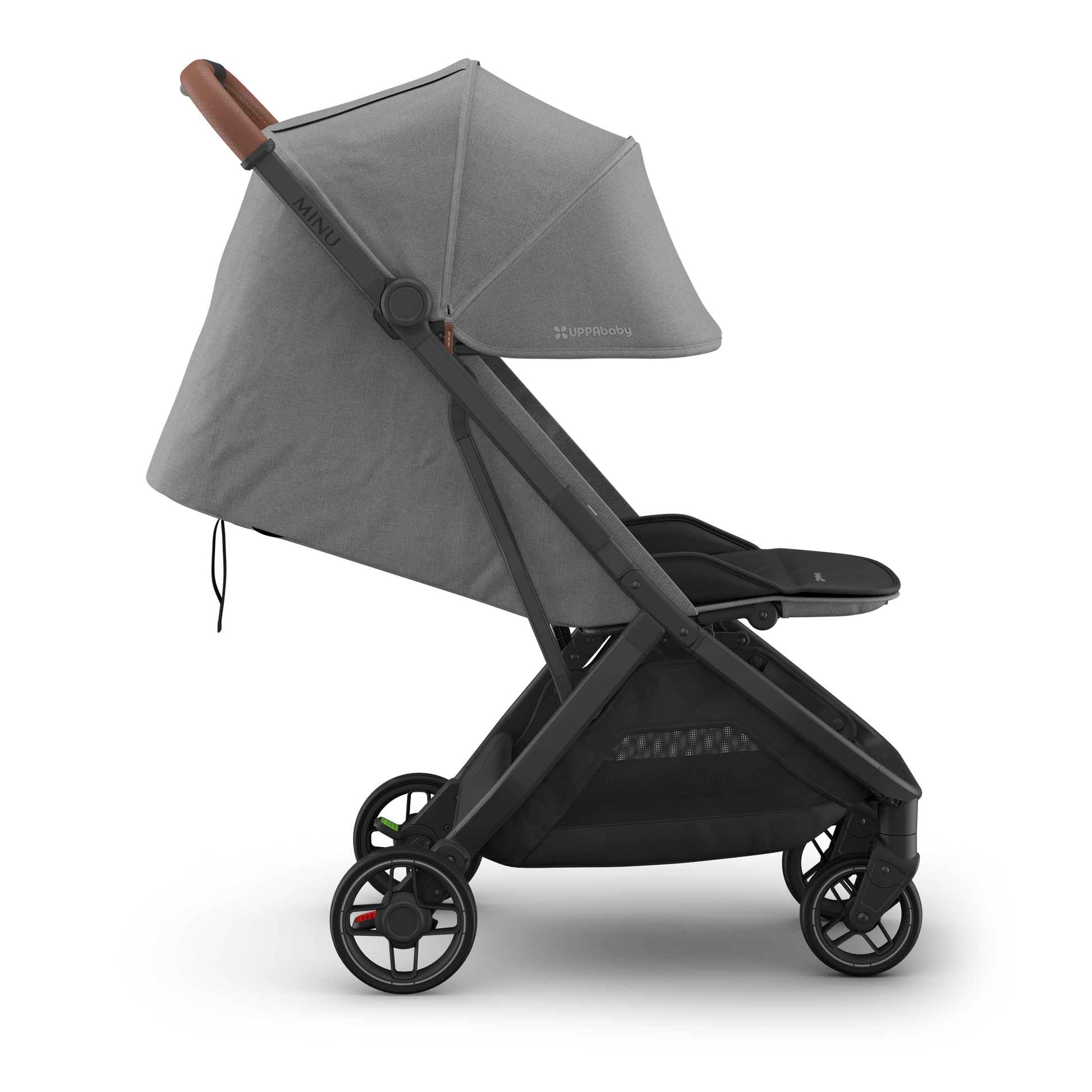 Travel stroller with charcoal canopy, black frame and tan leather handle. Side.