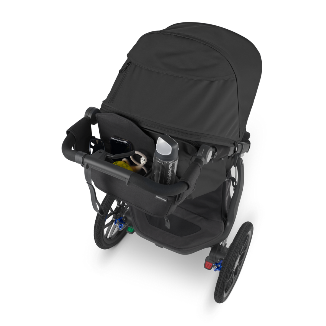 Black UPPAbbaby parent console fitted to stroller.