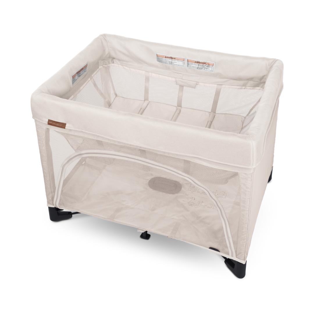 UPPAbaby Remi Port a Cot Charlie Sand/Cream Coloured Fabric.