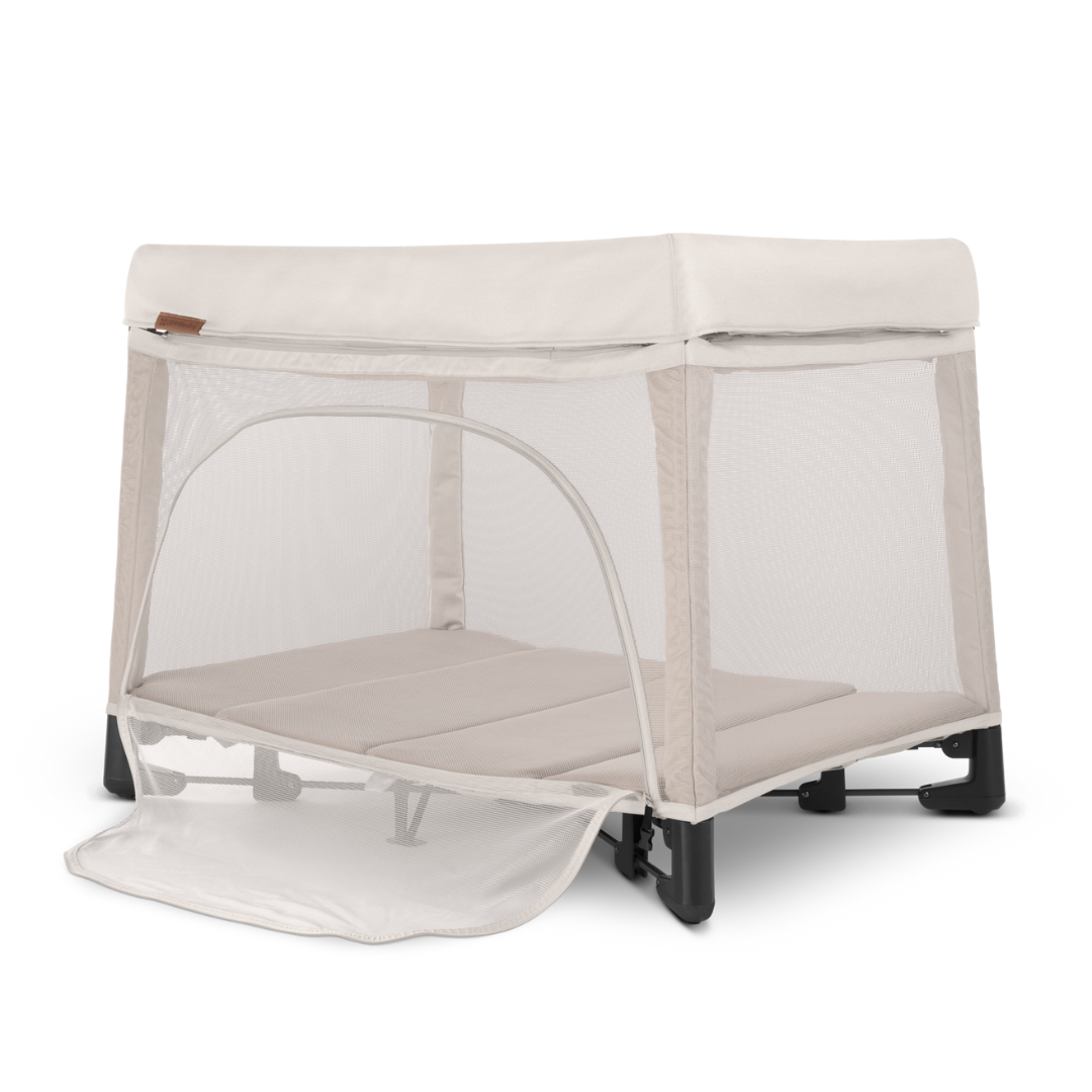 UPPAbaby Remi Port a Cot Charlie Sand/Cream Coloured Fabric.
