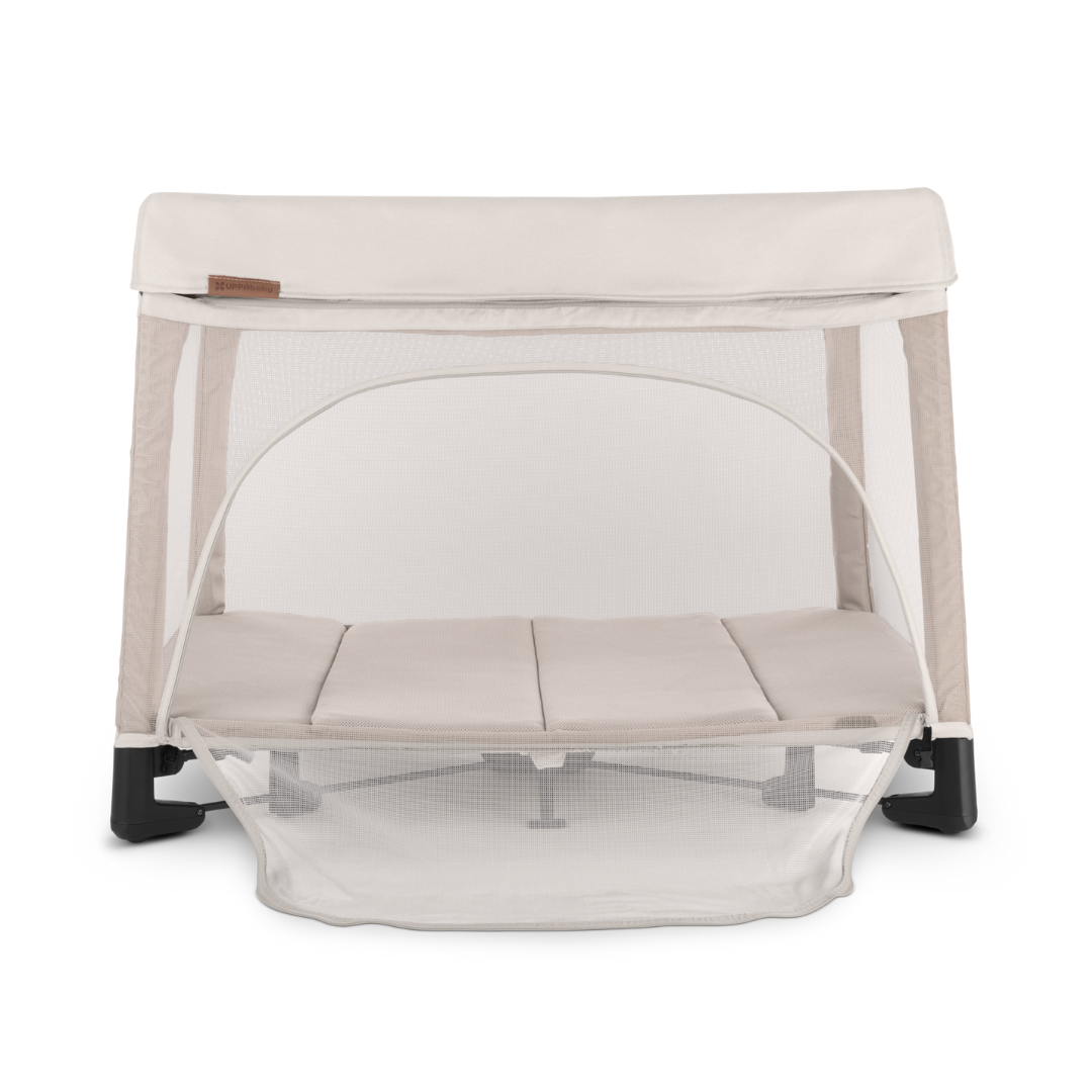 UPPAbaby Remi Port a Cot Charlie Sand/Cream Coloured Fabric.