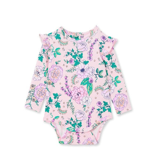 Floral long sleeve onesie with ruffle shoulder detail. All over floral print on light pink base. 