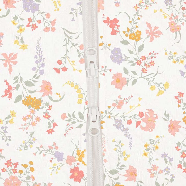 Classic sleeveless 1 TOG sleeping bag in fresh spring blossom print. 