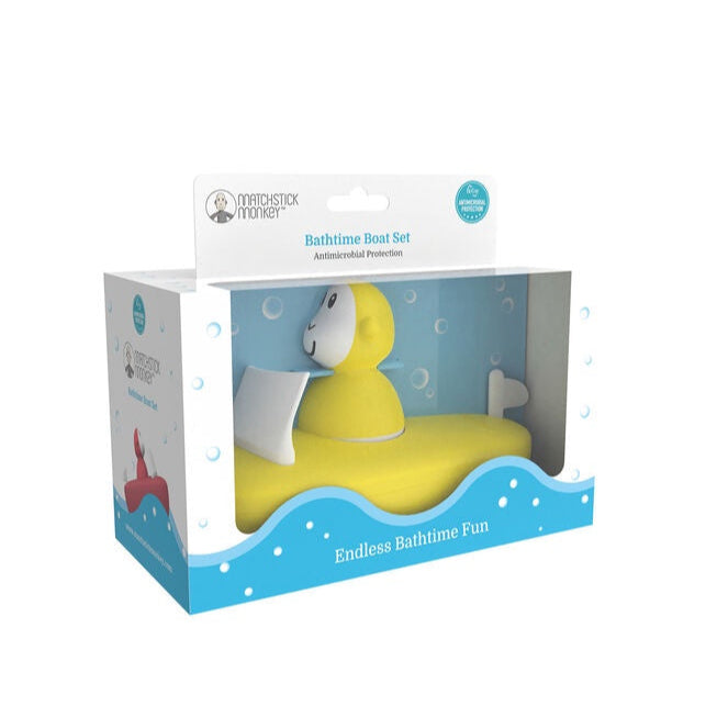 Yellow and white silicone boat set with bobbing monkey.