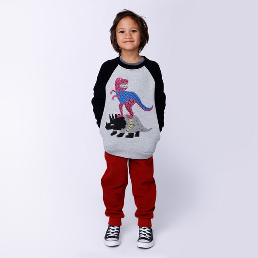 Long sleeve crew sweatshirt with black sleeves, grey marl base with two colourful dinosaurs one on top of the other. 