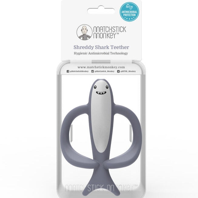 Grey and white shark silicone teething toy in gift pack.
