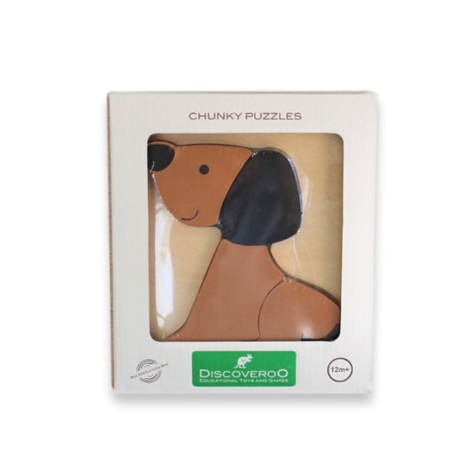 Boxed dog-shaped puzzle with 'Discoveroo' branding on a white background