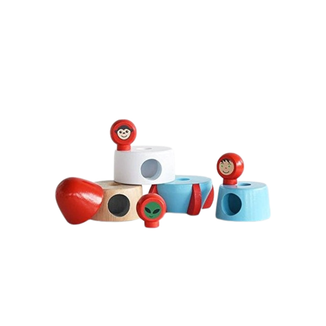 Set of colorful wooden toys with character faces on a white background