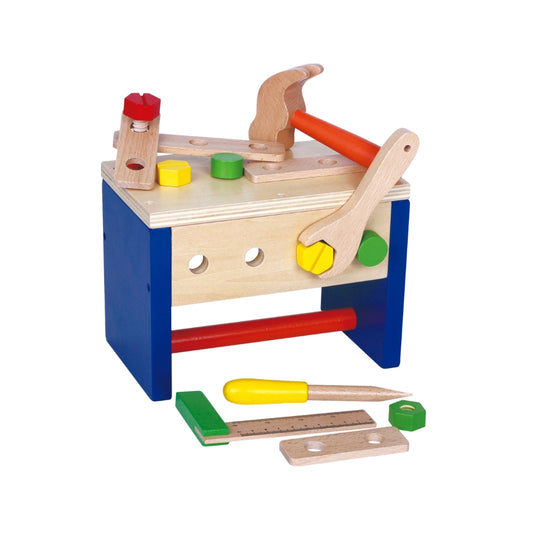 Wooden toy workbench with tools on a white background