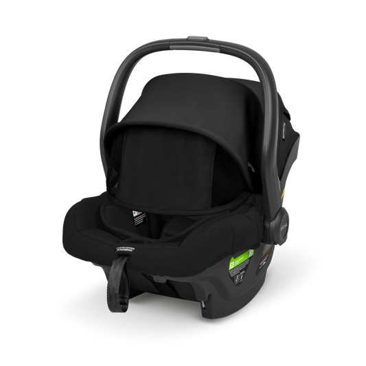 Black baby car seat on a white background