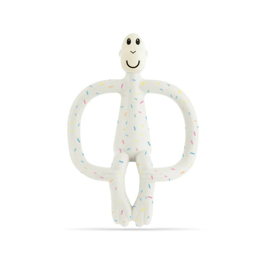 White teething toy with colourful sprinkles on a white background