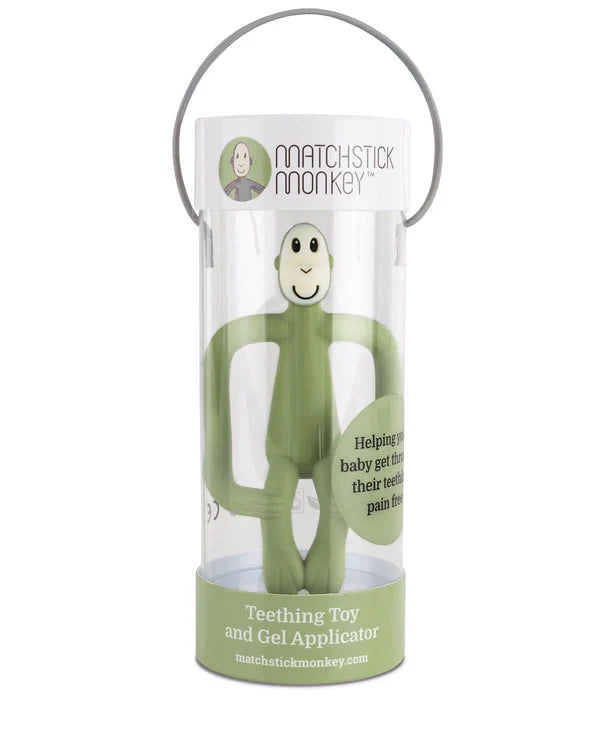 Green teething toy in a transparent packaging tube with 'Matchstick Monkey' branding on a white background.