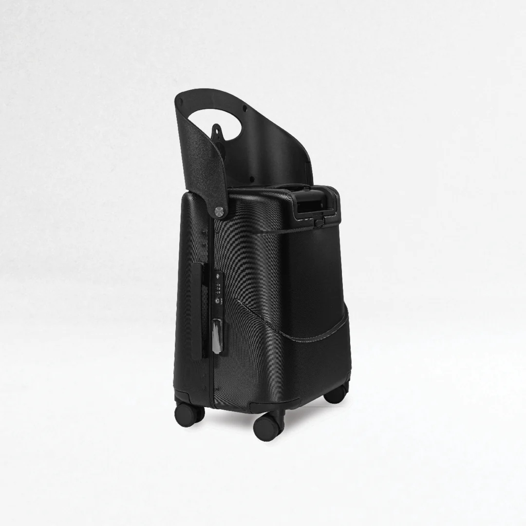 Black carry on suitcase with seat  on a light white background