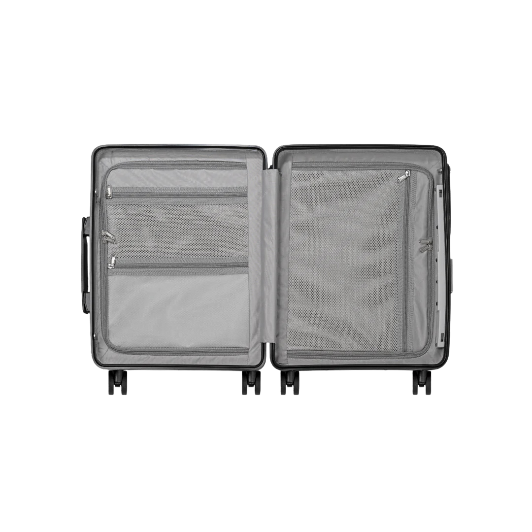 Open suitcase with interior compartments on a white background