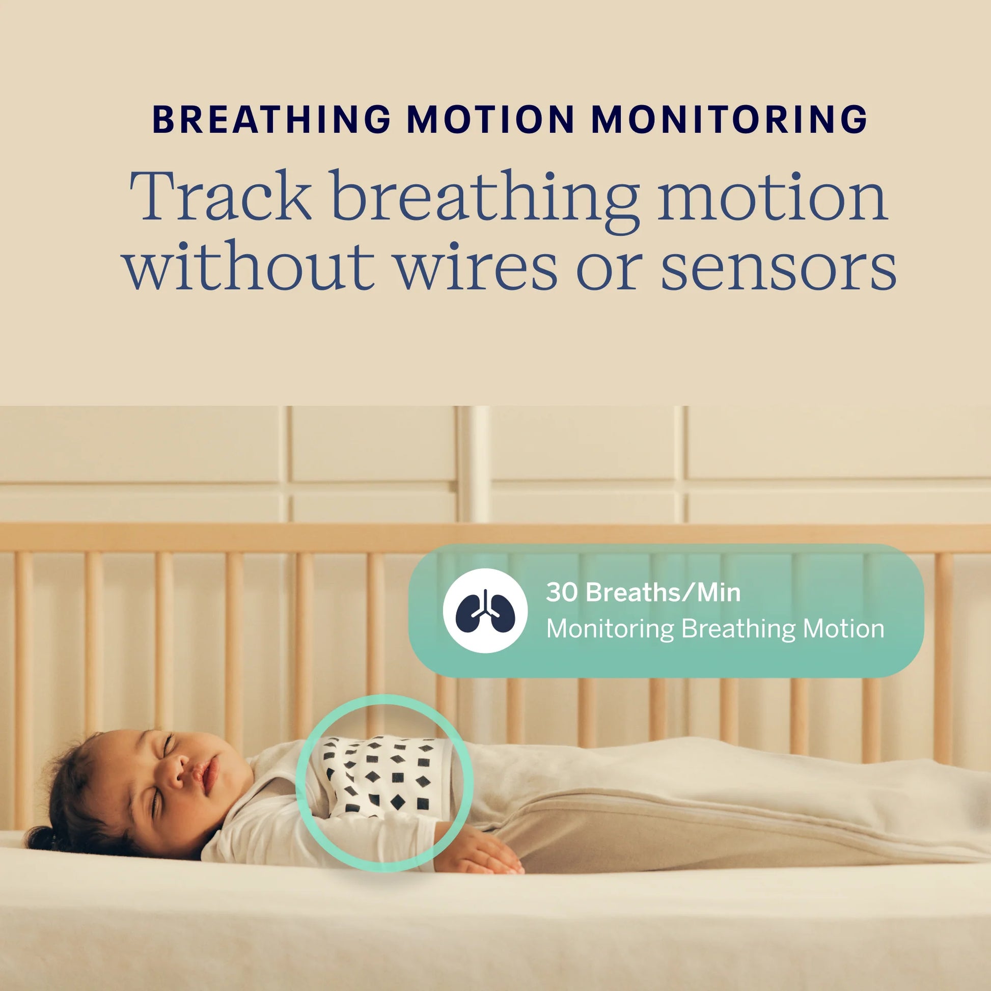 Baby lying in a crib with a breathing motion monitoring device, text about tracking breathing motion without wires or sensors.