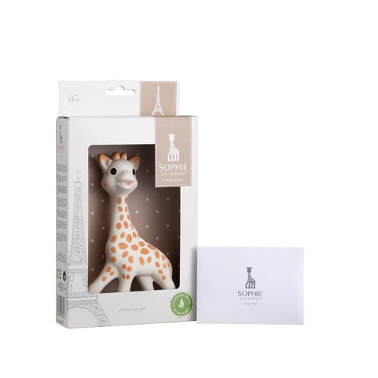Giraffe toy in packaging with visible branding on a white background