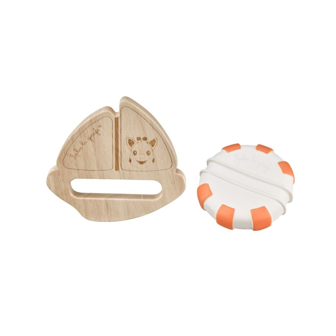 Bath Toy with wooden boat with giraffe on it and rubber ring attached. 
