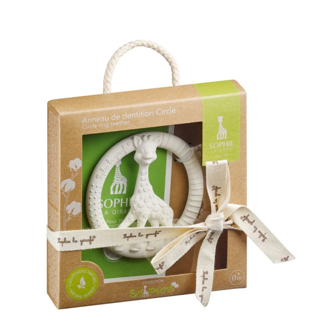 Sophie la giraffe circle teething toy in brown gift box with ribbon on a white background. 