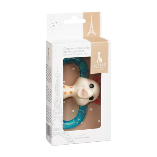 Sophie La Giraffe Teething ring with blue handle and white dot design in packaging, featuring Sophie la girafe brand.