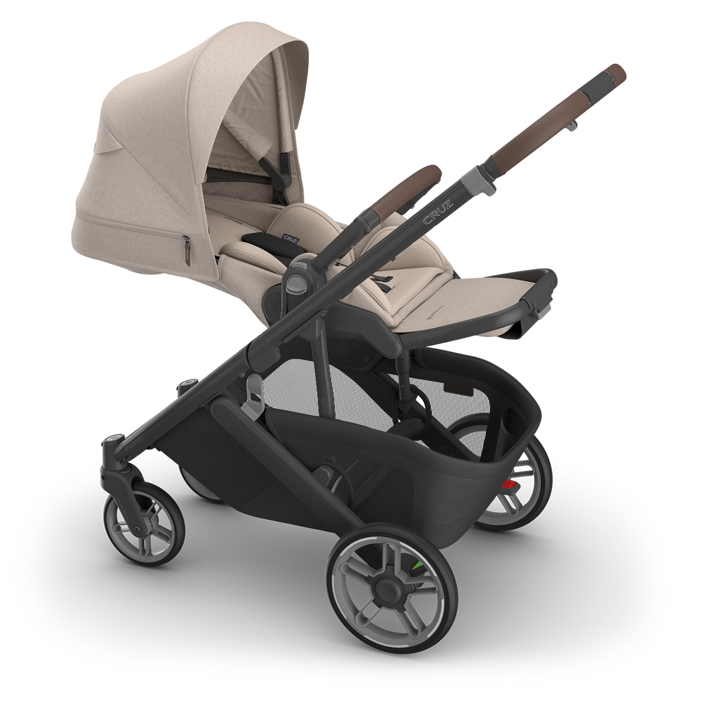 Beige and black stroller on a white background