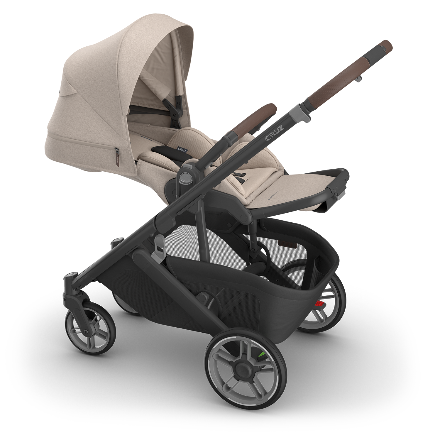 Beige and black stroller on a white background