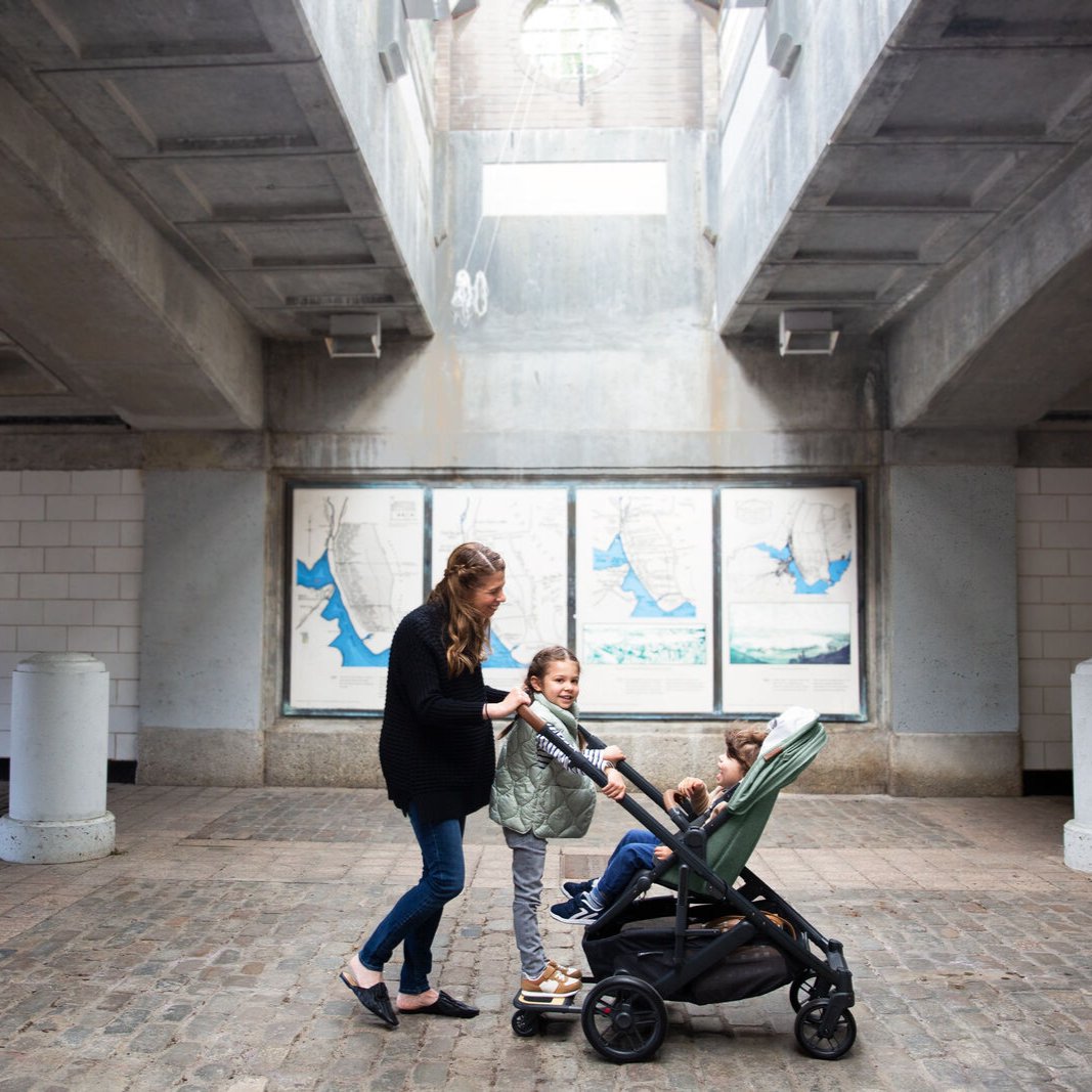 UPPAbaby Cruz Stroller in Gwen (Green Melange) lifestyle image. 