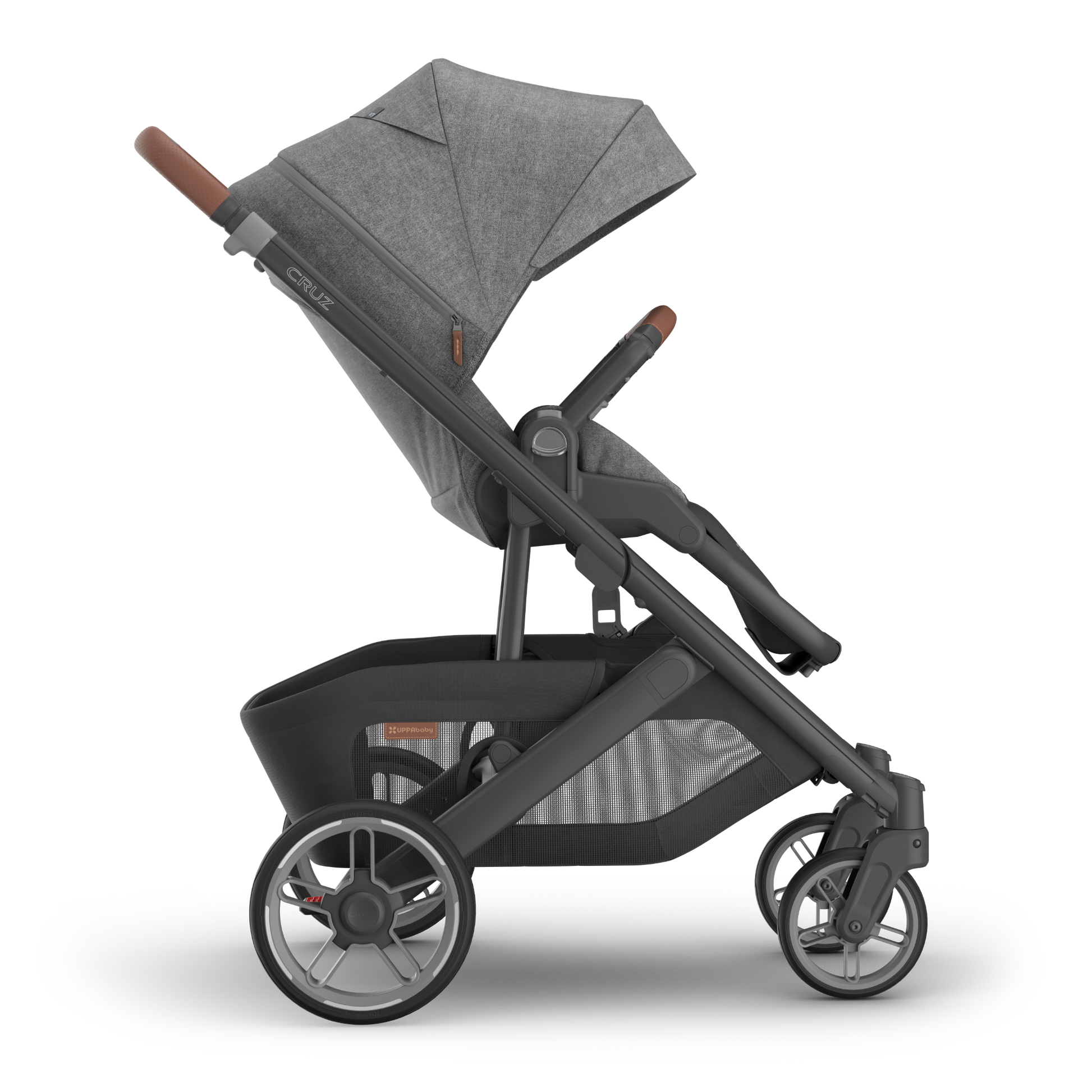 UPPAbaby Cruz V3 stroller with charcoal canopy and carbon frame with tan leather accents side on on a white background. 