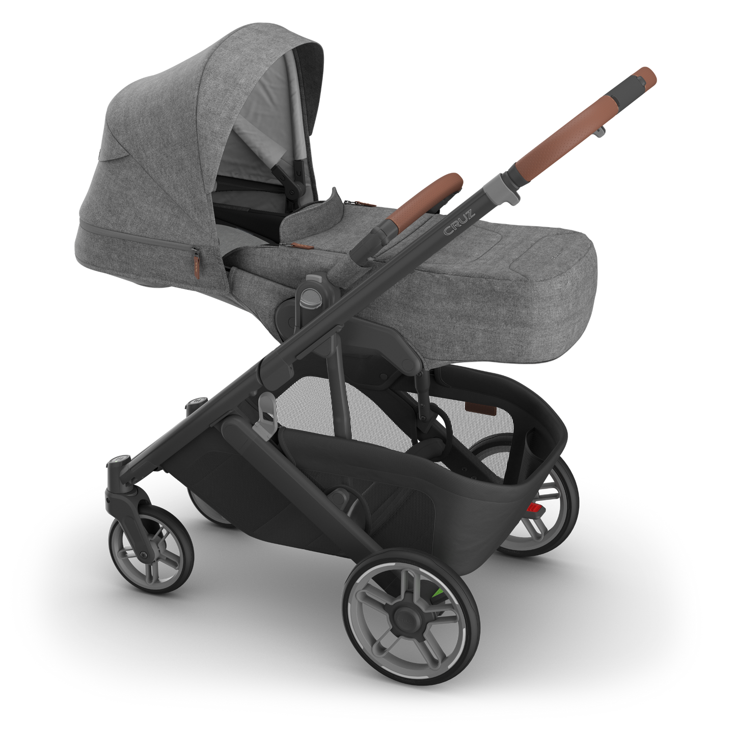 Charcoal stroller with infant insert attached an canopy extended on carbon frame. 