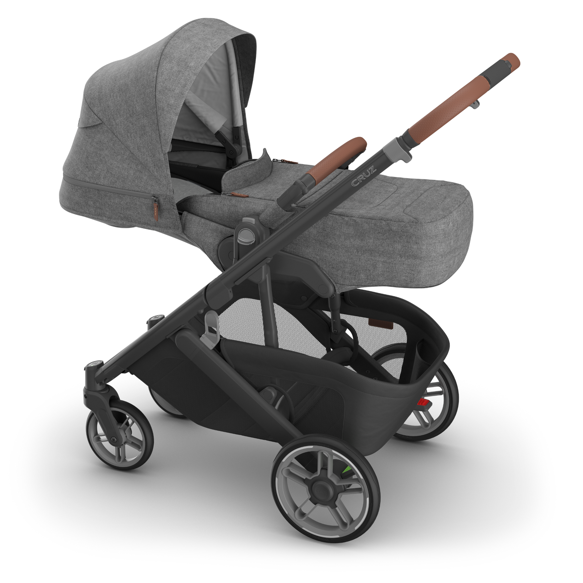 Charcoal stroller with infant insert attached an canopy extended on carbon frame. 