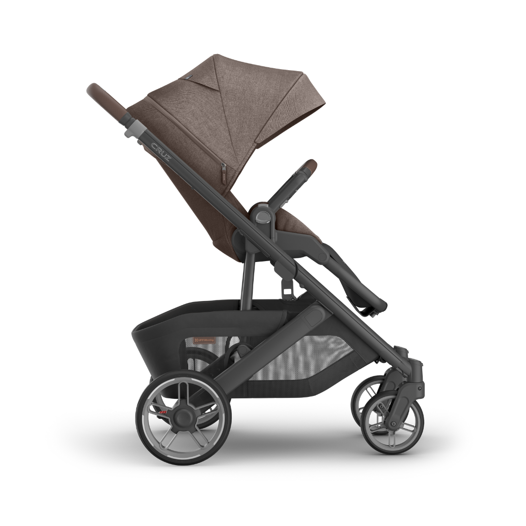 Stroller with Carbon black frame, Mocha melange fabric and chestnut leather accents.  