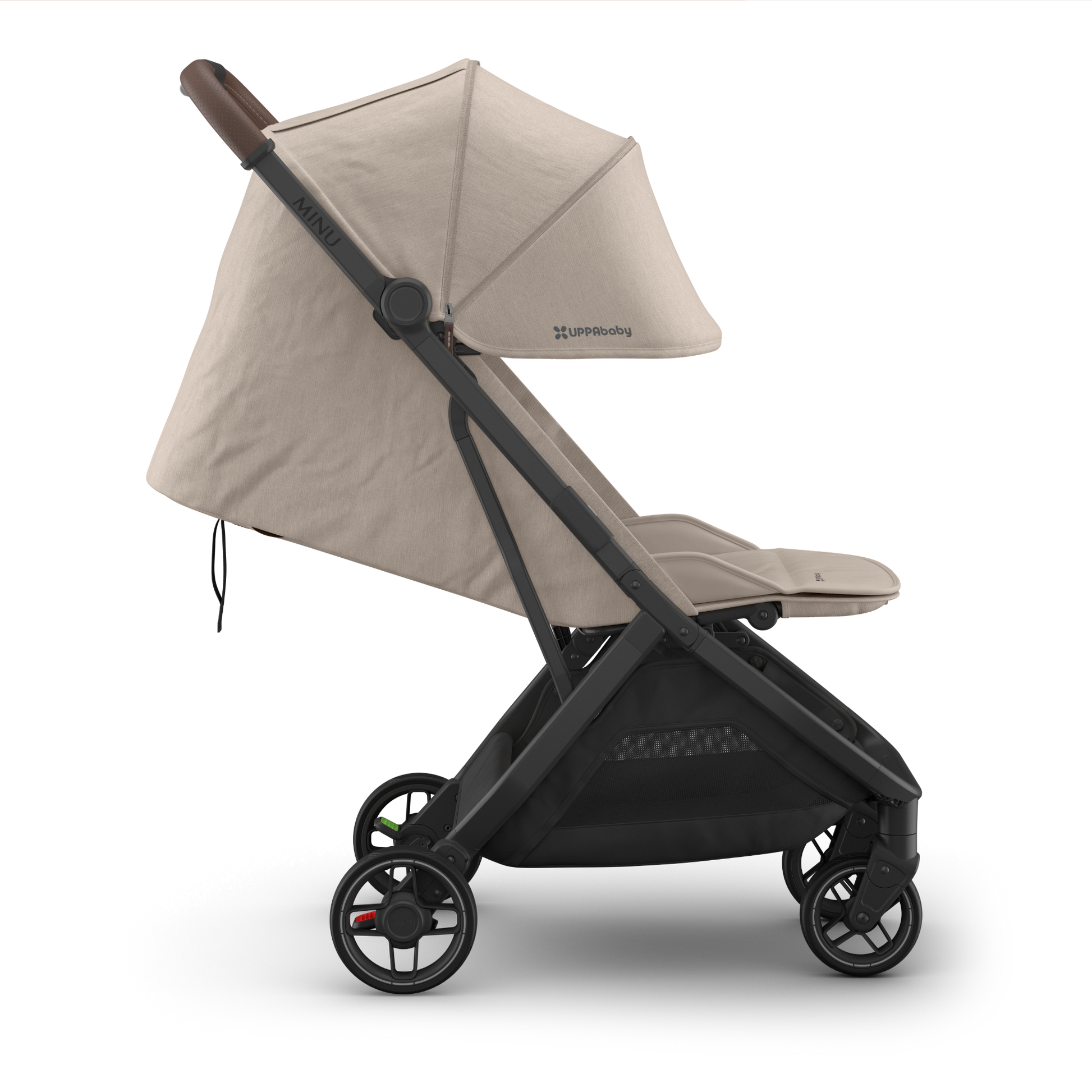Beige UPPAbaby travel stroller with black frame side view on a white background