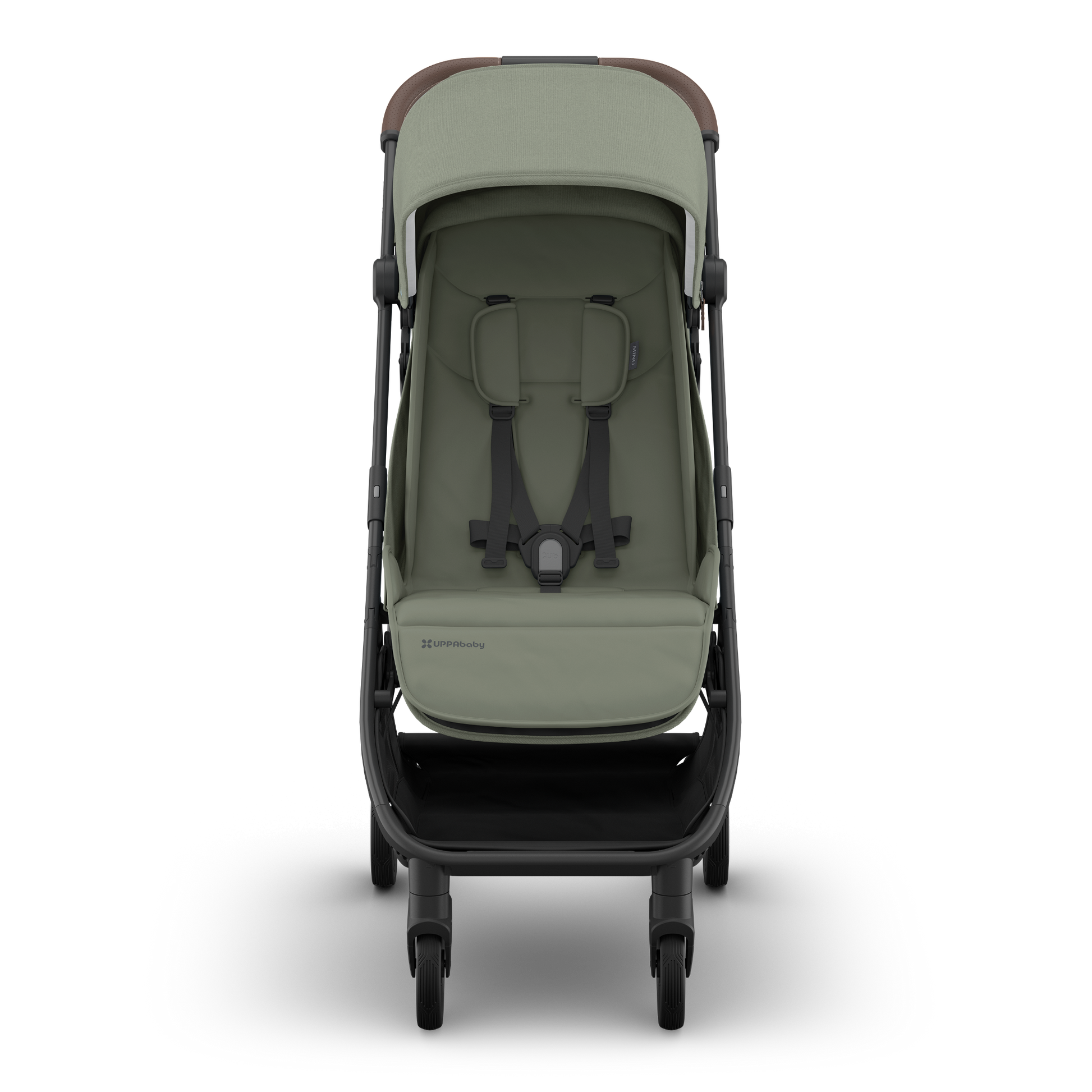 Green UPPAbaby Travel stroller with brown accents and carbon frame on a white background