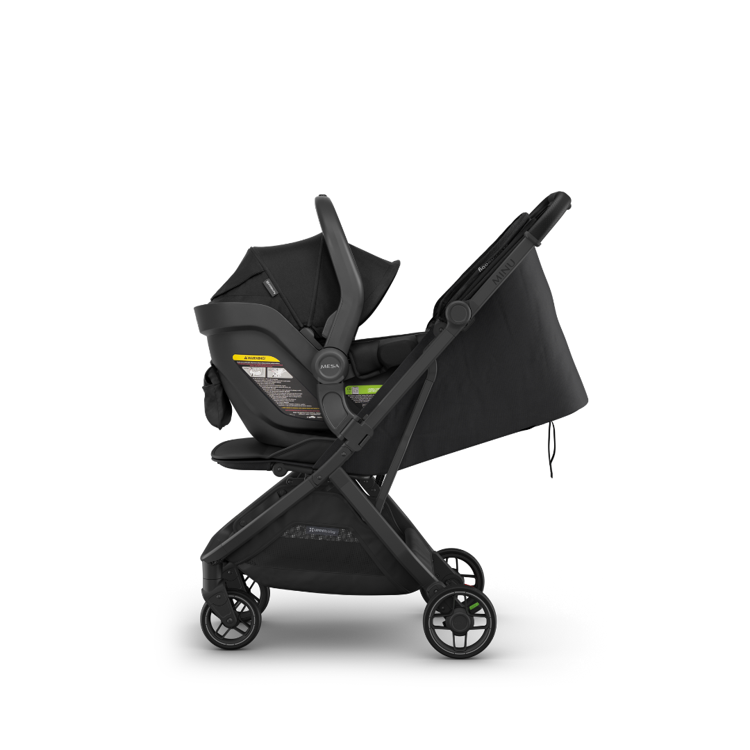 UPPAbaby Black Minu V3 Stroller with Black Mesa Capsule attached on white background. 