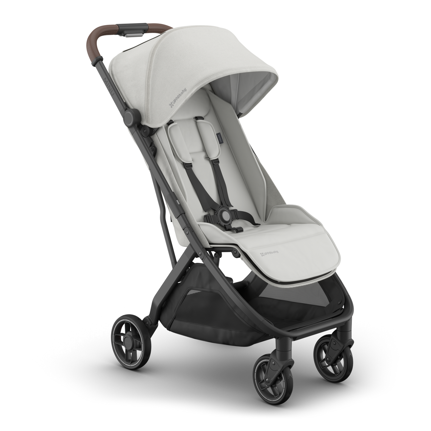Travel stroller with grey pearl fabric, Carbon frame and saddle leather handle. 