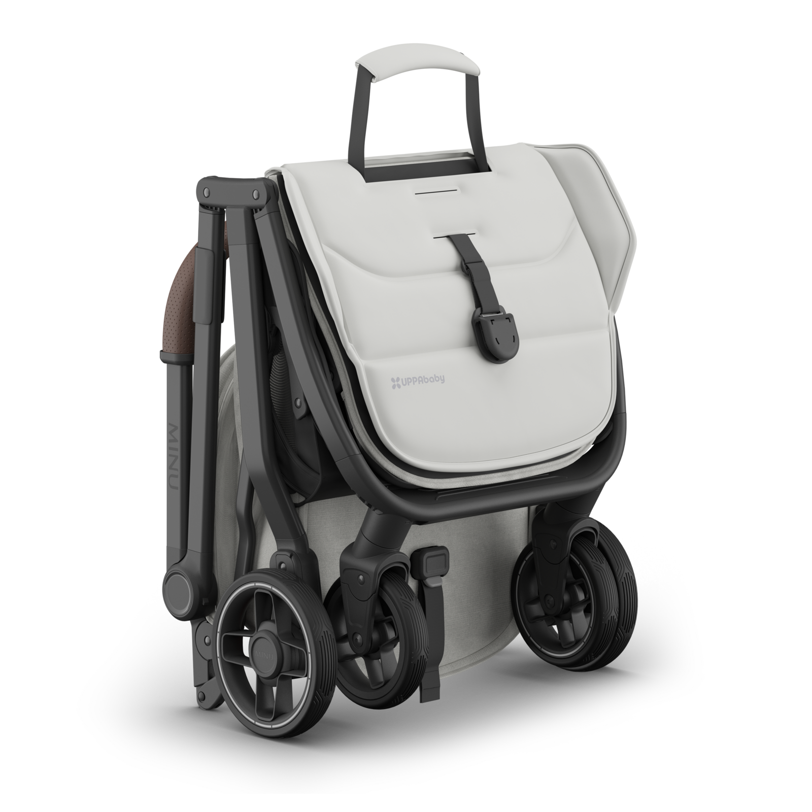 Travel stroller with grey pearl fabric, Carbon frame and saddle leather handle. Folded. 