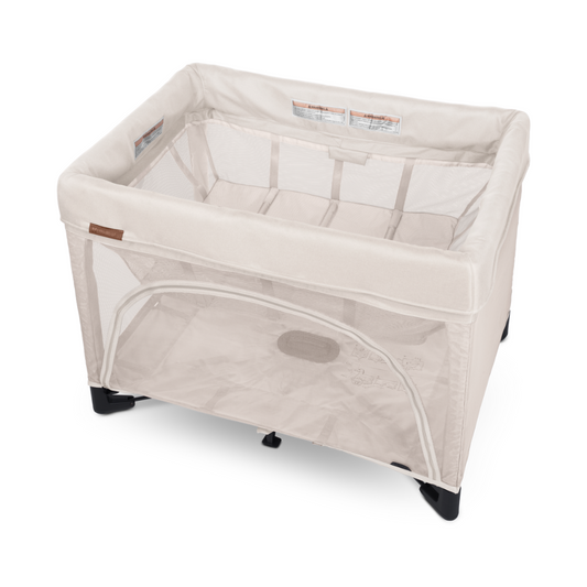 UPPAbaby Remi Port a Cot Charlie Sand/Cream Coloured Fabric. 