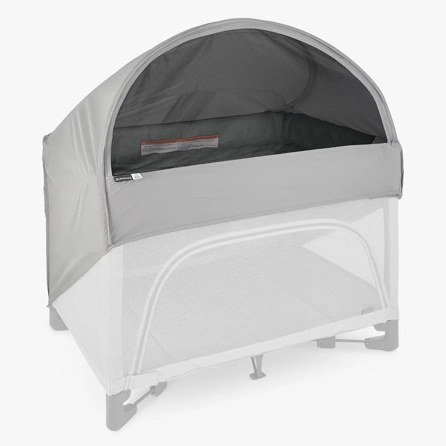 Grey canopy shade attached to UPPAbaby Remi Portacot on a white background. 