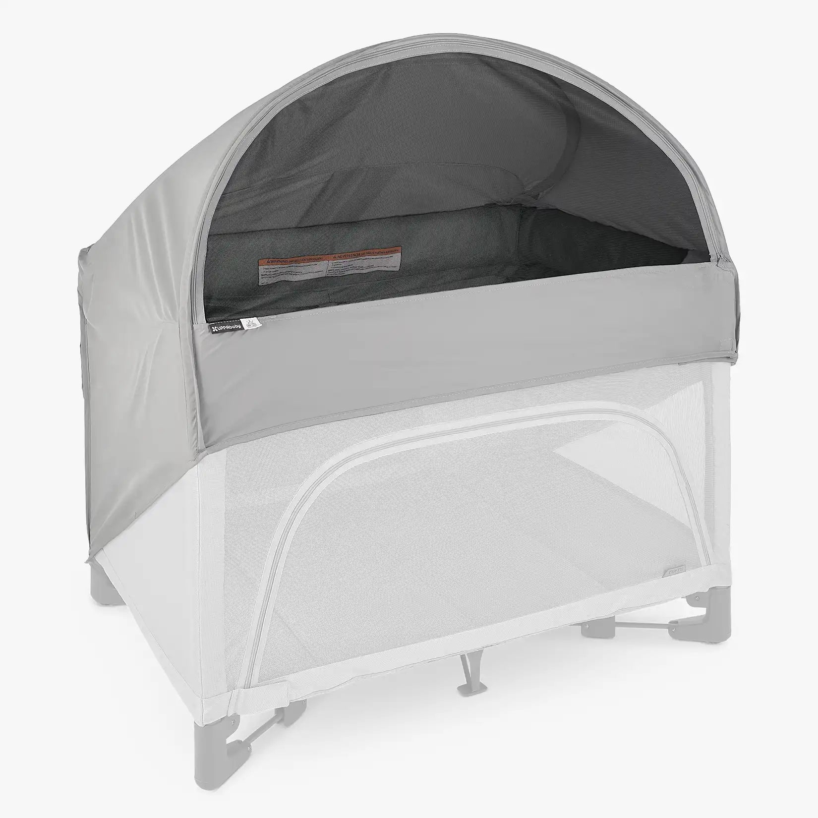 Grey canopy shade attached to UPPAbaby Remi Portacot on a white background. 