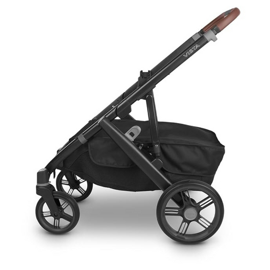 UPPAbaby Vista Black stroller with brown handle on a white background showing UPPAbaby basket cover 