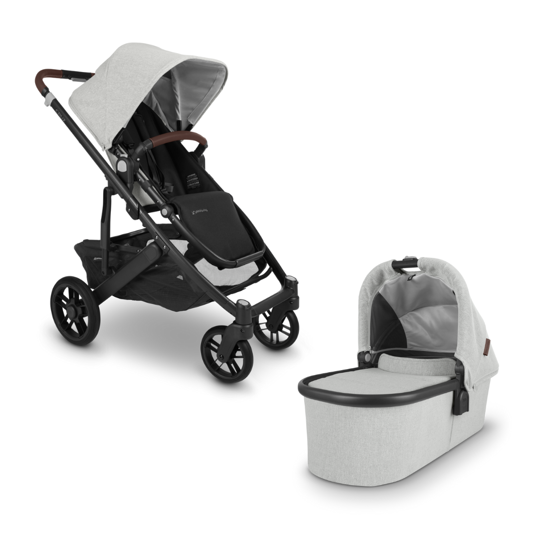 UPPAbaby Cruz V2 with Bassinet Grey Chenille fabric with carbon frame and chestnut leather accessories. 