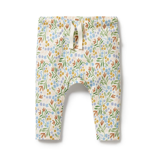 Baby legging cream base with neutral all over floral print. Cream drawstring waist tie. 