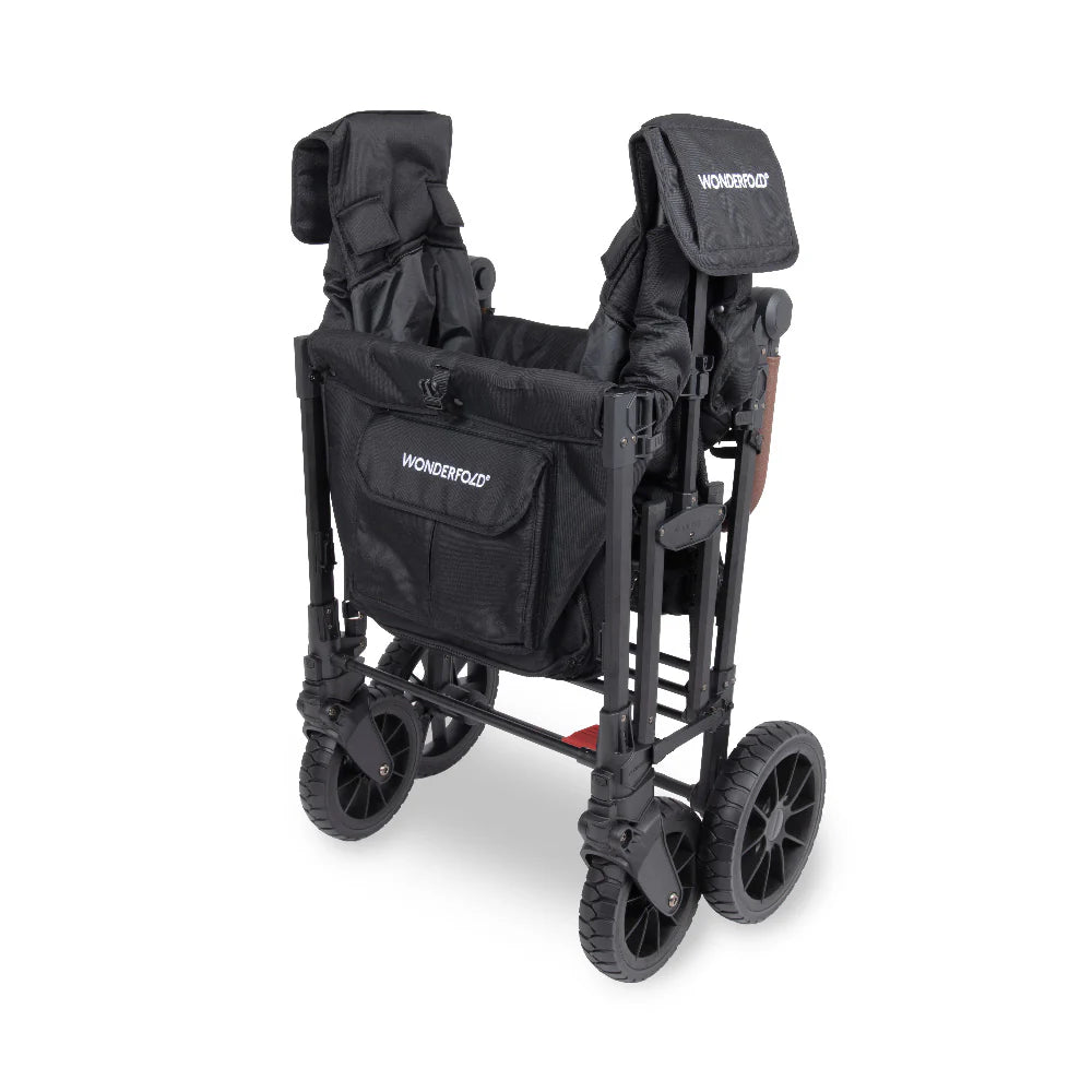 Wonderfold Stroller wagon in black folded on a white background. 