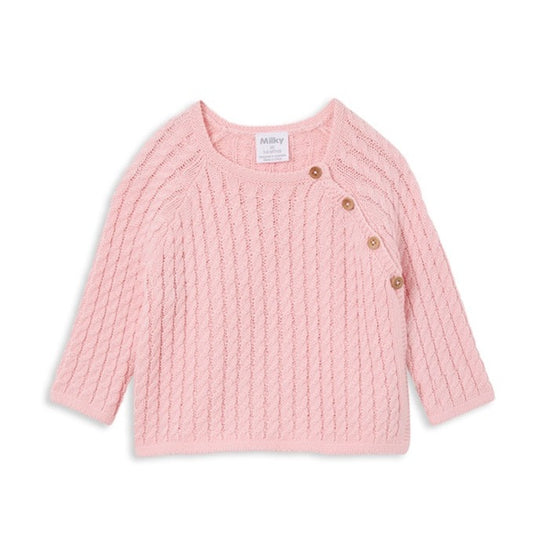 Sweet baby pink longsleeve cardigan with wood look buttons diagonally accross the chest. 